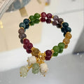 Bohemian Multicolor Beaded Bracelet with Lily of the Valley Charm